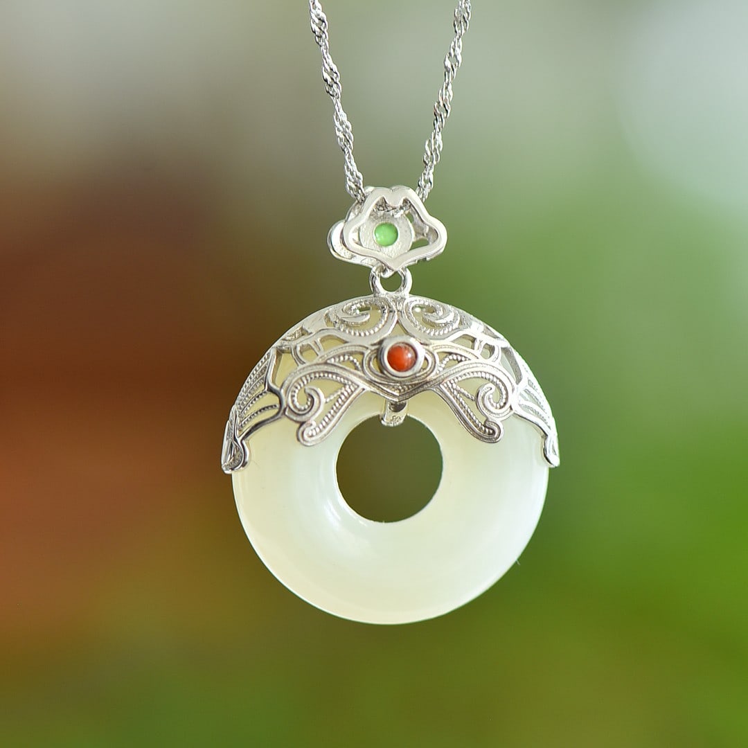 An Exquisite Sterling Silver Inlaid White Jade Pendant: An Exquisite Sterling Silver Inlaid White Jade Pendant,Size:25mmx25mm 纯银镶白玉吊坠