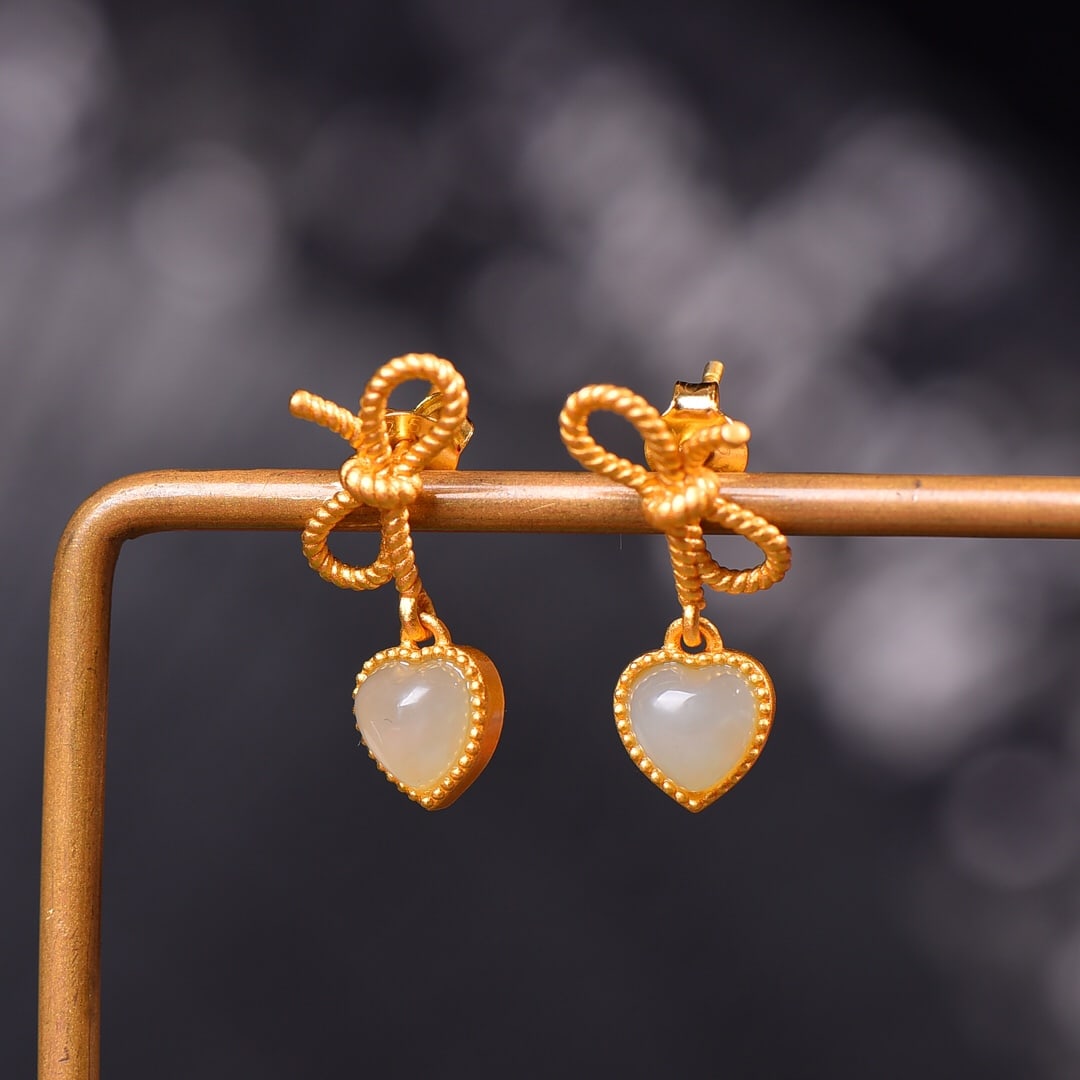 A Pair of Exquisite Sterling Silver-Gold Plated Inlaid White Jade Earrings: A Pair of Exquisite Sterling Silver-Gold Plated Inlaid White Jade Earrings 一对纯银镀金镶白玉耳环
