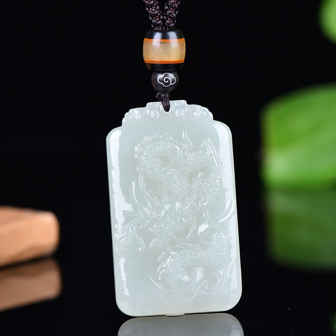 An Exquisite White Jade Dragon Pattern Pendant: An Exquisite White Jade Dragon Pattern Pendant,Size:49mmx29mm 白玉龙纹吊坠