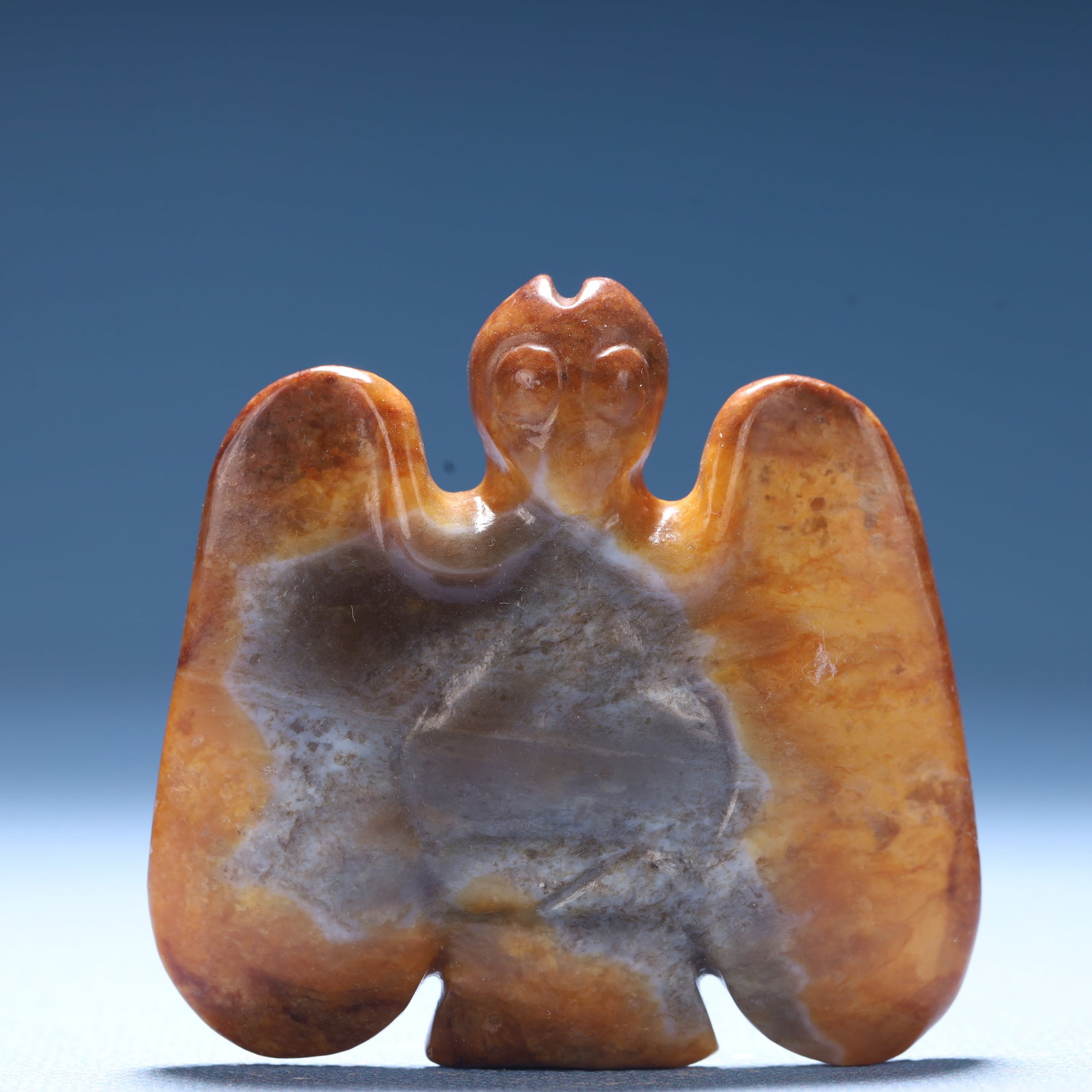 An Archaic Hongshan Culture Yellow Jade Bats Ornament: An Archaic Hongshan Culture Yellow Jade Bats Ornament,Ancient Time,China,Size:2.2inx0.5in,Weight:61.6g 红山文化黄玉蝙蝠摆件,中国