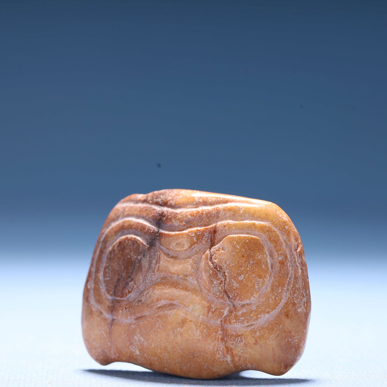 An Archaic Hongshan Culture Yellow Jade Pendant: An Archaic Hongshan Culture Yellow Jade Pendant,Ancient Time,China,Size:1.9inx1.5inx1.1in,Weight:46.2g 红山文化黄玉挂件,中国新石