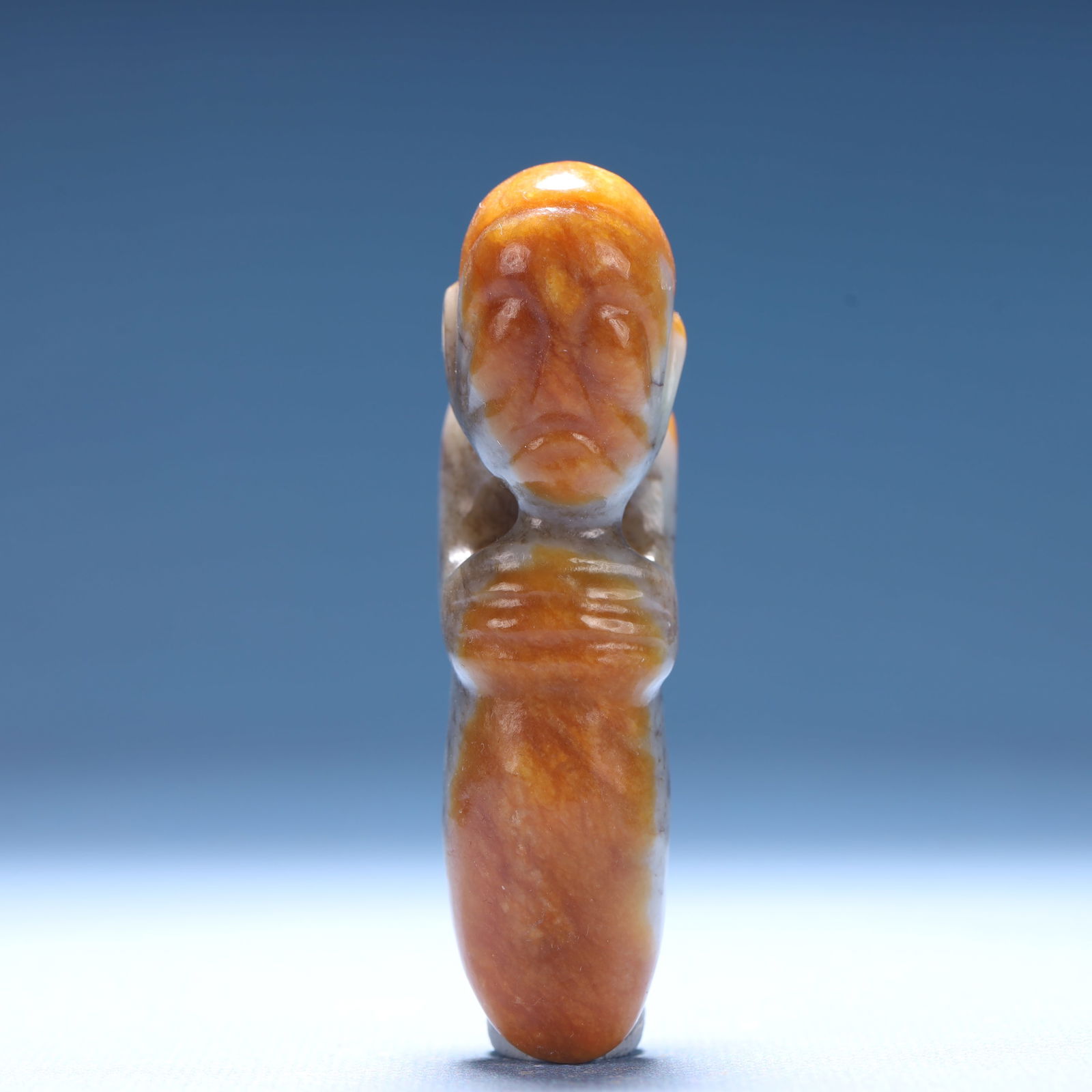 An Archaic Hongshan Culture Yellow Jade Figure Ornament: An Archaic Hongshan Culture Yellow Jade Figure Ornament,Ancient Time,China,Size:1.6inx0.8inx2.9in,Weight:77.9g 红山文化黄玉人物摆件,中