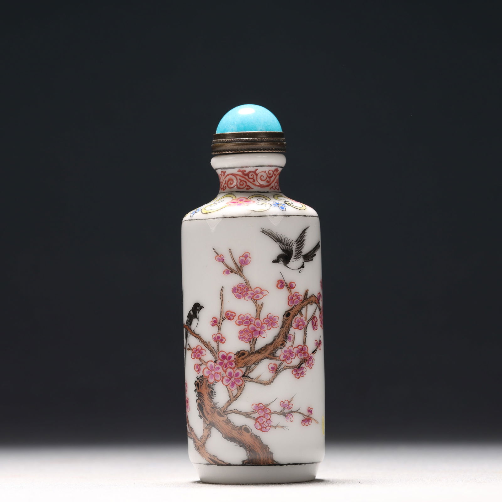 A Fine Enamel Flower and Bird Pattern Porcelain Snuff Bottle: A Fine Enamel Flower and Bird Pattern Porcelain Snuff Bottle, Qing Dynasty, China, Qianlong Four-character Mark, Size:1.2inx3.3in 瓷胎画珐琅彩花鸟ಬ