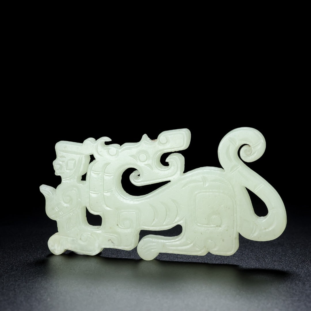 A Exquisite Hotan Jade Dragon Jade Bi: A Exquisite Hotan Jade Dragon Jade Bi,Qing Dynasty, China,Size:4.2inx2.3inx0.2in,Weight:65.8g 和田玉龙玉璧,中国清代