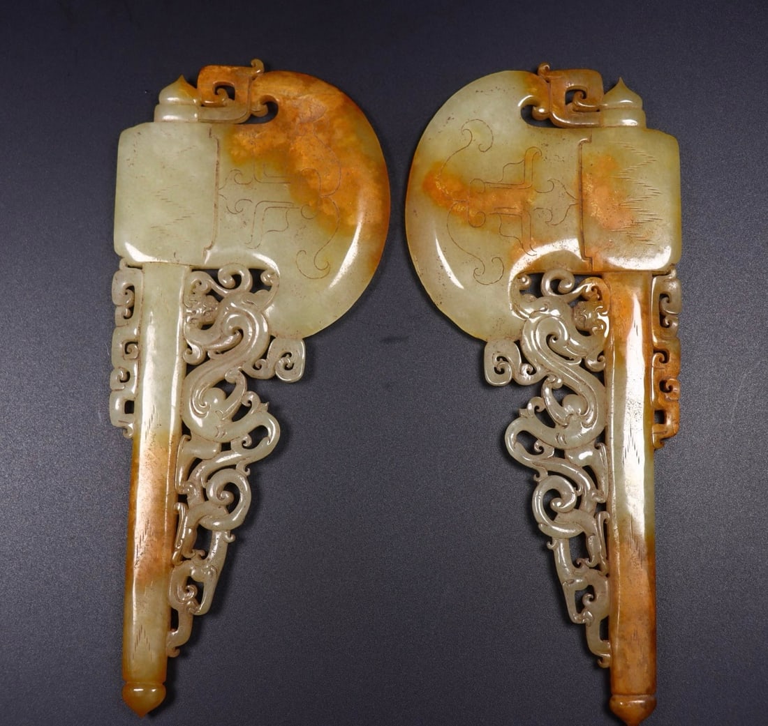 A Pair of Exquisite Hotan Jade Hatchet: A Pair of Exquisite Hotan Jade Hatchet,Han Dynasty, China,Size:3.9inx0.3inx8.7in,Weight:273g(each) 一对和田玉斧头,中国汉代