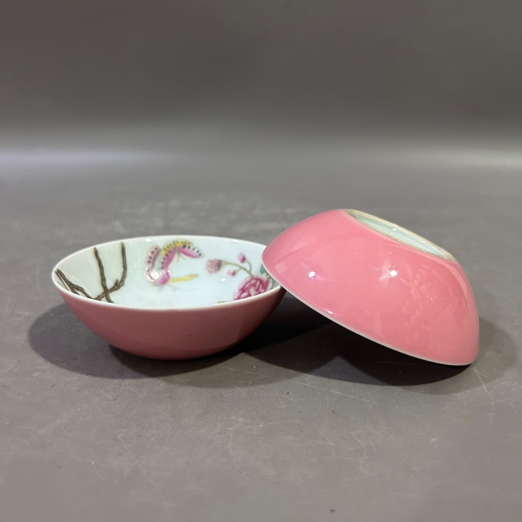A pair of Exquisite pink ground Famille-Rose Flower Pattern Cup: A pair of Exquisite pink ground Famille-Rose Flower Pattern Cup,Qing Dynasty, China,Yongzheng Four-character Mark,Size:3.9inx1.3in 