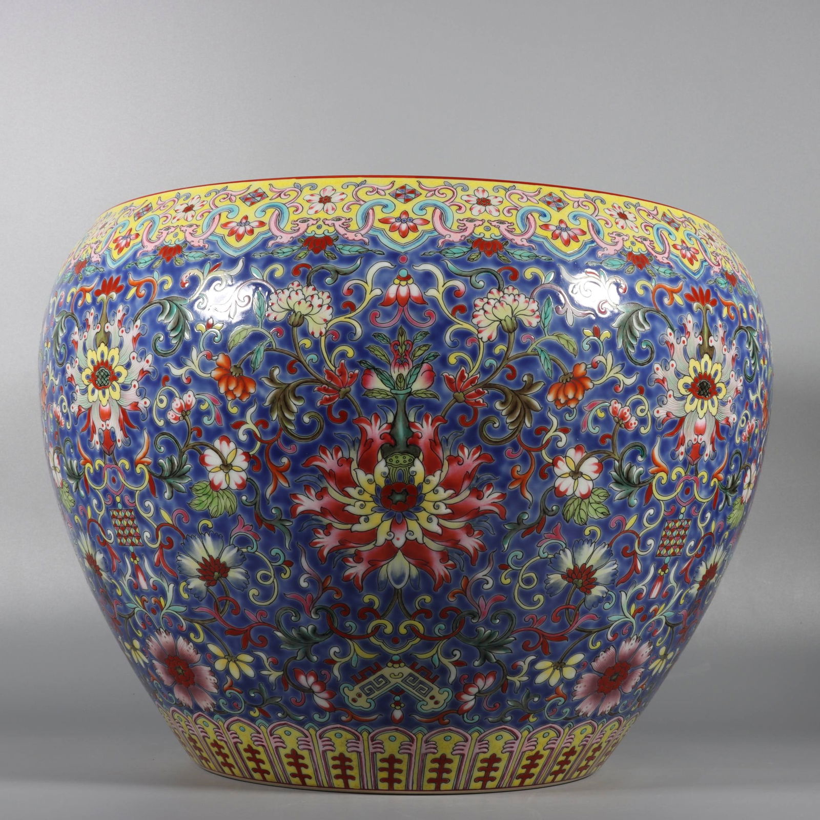 A Exquisite Famille-Rose Blue Ground Lotus Eight Treasures Pattern Vat: A Exquisite Famille-Rose Blue Ground Lotus Eight Treasures Pattern Vat,Qing Dynasty, China,Qianlong Six-character Mark,Size:10.6inx12.6inx8.3in 