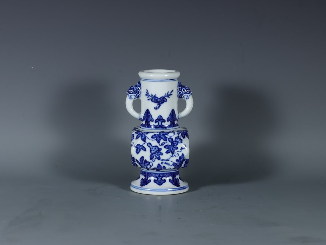 A Exquisite Blue and White Gourd-Shaped Elephant-Ears Vase: A Exquisite Blue and White Gourd-Shaped Elephant-Ears Vase,Qing Dynasty, China,Yongzheng Six-character Mark,Size: 7inx3.4inx2.4inx3.4in 