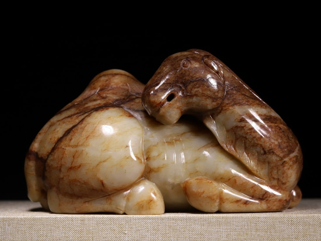A Exquisite Hotan Jade Camel Ornament: A Exquisite Hotan Jade Camel Ornament,Qing Dynasty, China,Size:7.5inx3.8inx4.2in,Weight:2938g 和田玉骆驼摆件,中国清代