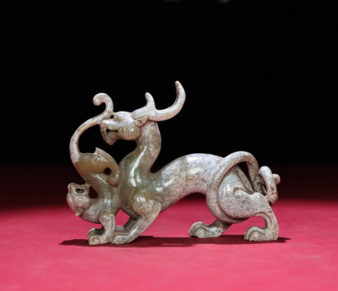 A Exquisite Hetian Jade Dragon Ornament: A Exquisite Hetian Jade Dragon Ornament,Han Dynasty, China,Size:4.5inx3.6inx1.1in,Weight:185g 和田玉龙摆件,中国汉代