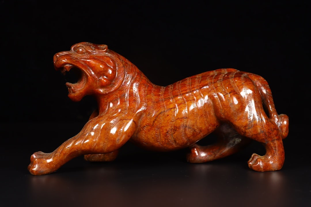A Exquisite Hotan Jade Tiger Ornament: A Exquisite Hotan Jade Tiger Ornament,Han Dynasty, China,Size:11.2inx3.5inx5.7in,Weight:2903g 和田玉虎摆件,中国汉代