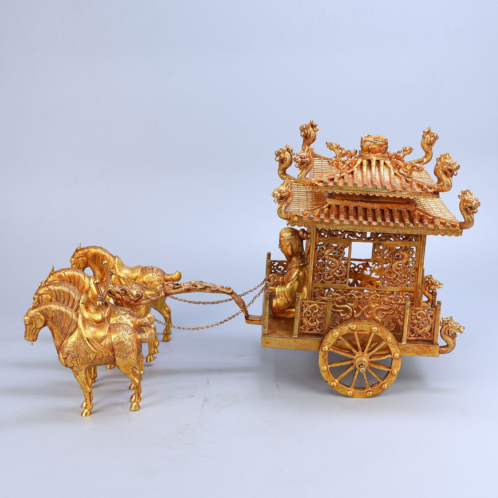 A Exquisite Bronze Gilt Openwork Carved Horse-Drawn Carriage: A Exquisite Bronze Gilt Openwork Carved Horse-Drawn Carriage,Qing Dynasty, China,Size:11.8inx18.9in,Weight:7324g 