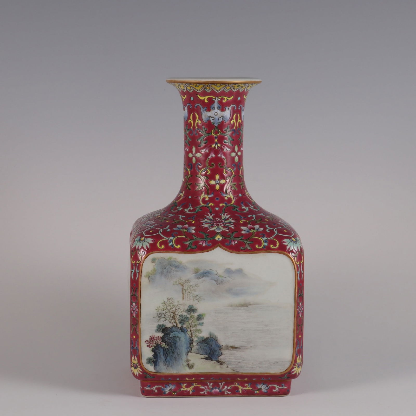 A Rare Carmine Red Ground Famille Rose Landscape Pattern Vase: A Rare Carmine Red Ground Famille Rose Landscape Pattern Vase,Qing Dynasty, China,Qianlong Six-character Mark,Size:9.8inx5.3in 