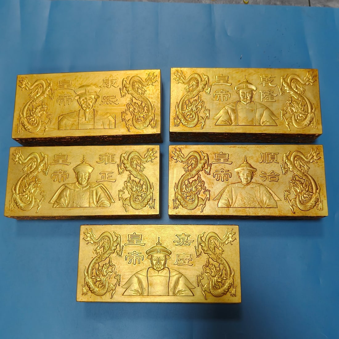 A Set of Exquisite Bronze Gilt Human Pattern Gold Bar: A Set of Exquisite Bronze Gilt Human Pattern Gold Bar,Qing Dynasty, China,Size:9.1inx4.1inx2in,Weight:9700g 