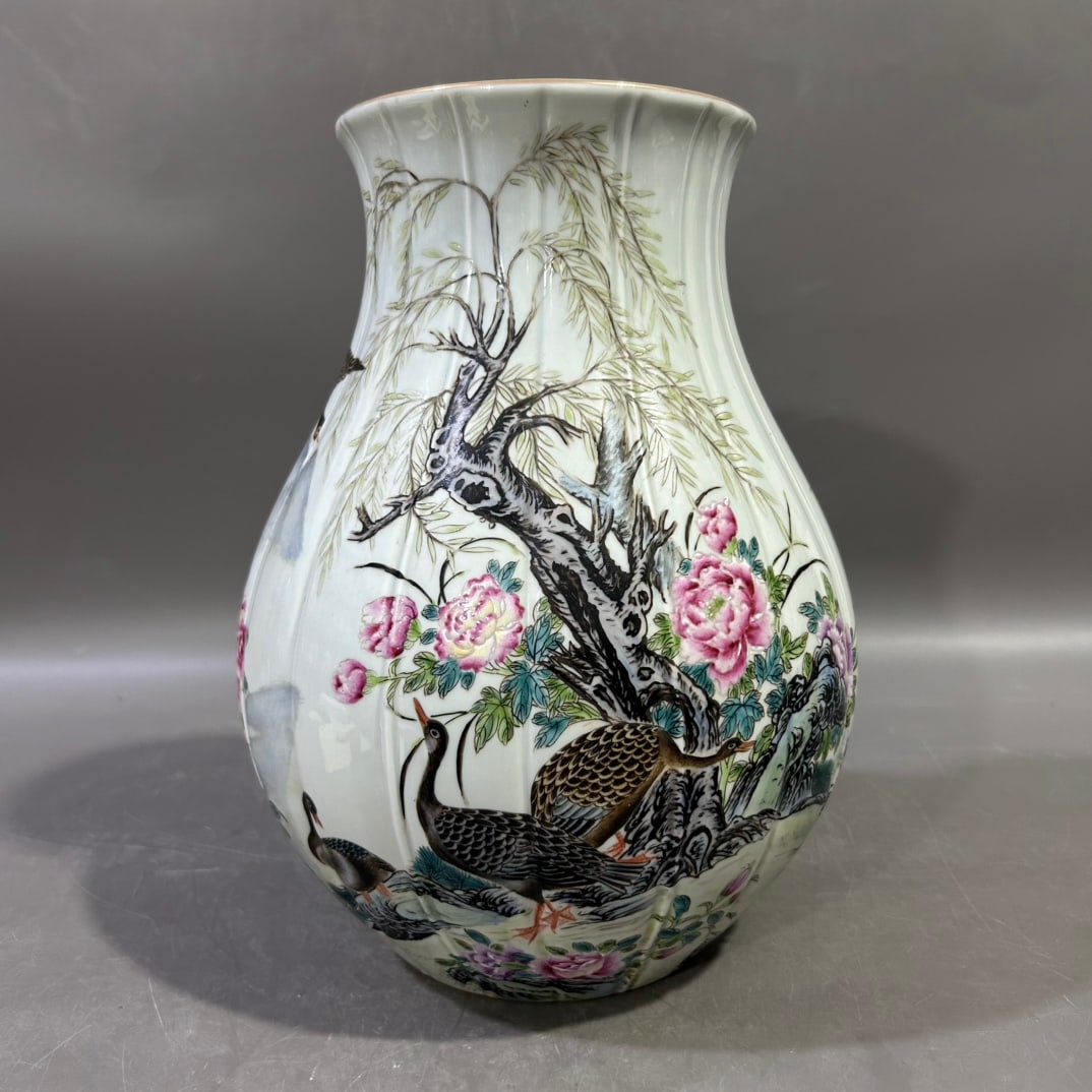 A Exquisite Famille-Rose Flower and Bird Pattern Vase: A Exquisite Famille-Rose Flower and Bird Pattern Vase,Qing Dynasty, China,Yongzheng Six-character Mark,Size:6.9inx11in 