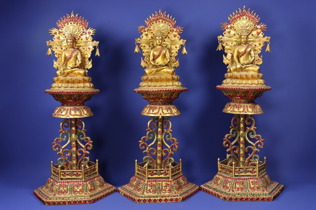 A set of Exquisite Gilt Bronze Full Inlaid Gems Blue Enamel Buddha Statue: A set of Exquisite Gilt Bronze Full Inlaid Gems Blue Enamel Buddha Statue,Qing Dynasty, China,Qianlong Four-character Mark,Size:8.7inx8.7in; 8.7inx8.7inx19.3in, Weight:12610g 