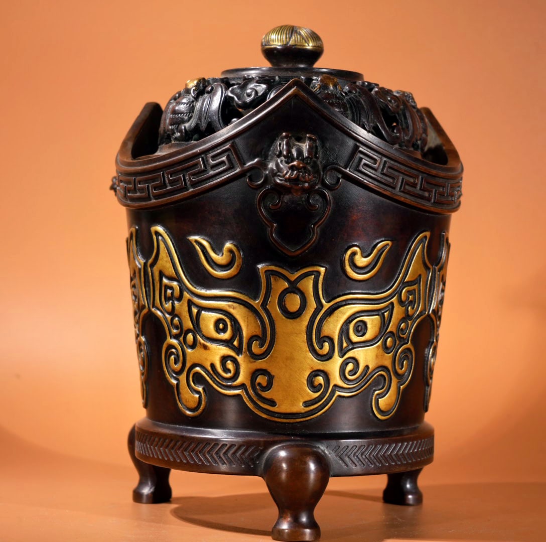 A Exquisite Gilt Bronze Dragon-Ears Censer: A Exquisite Gilt Bronze Dragon-Ears Censer,Ming Dynasty, China,Xuande Six-character Mark,Size:7.7inx5.3in,Weight:3120g 