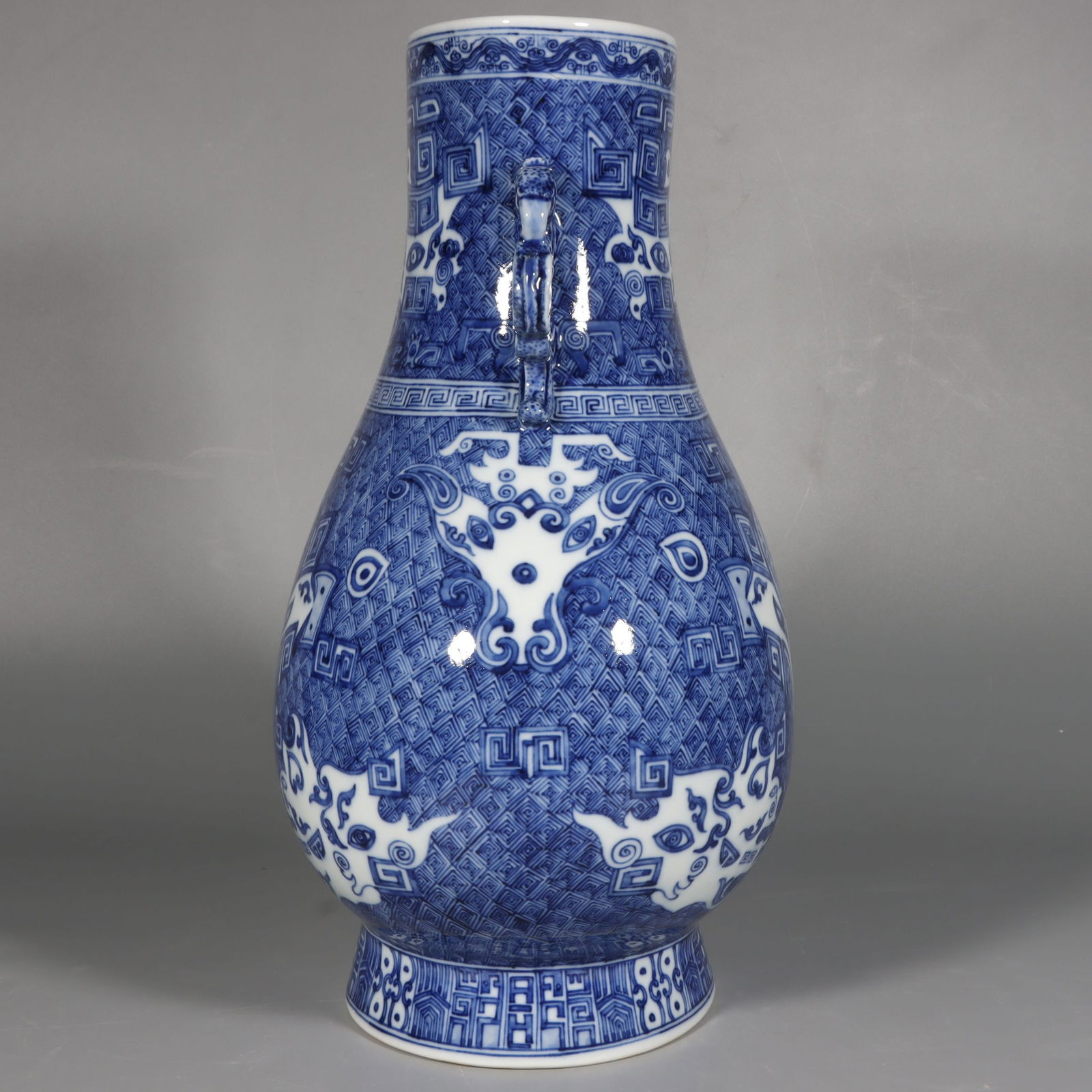 A Exquisite Blue and White Buffalo Pattern Beast-Ears Vase: A Exquisite Blue and White Buffalo Pattern Beast-Ears Vase,Qing Dynasty, China,Qianlong Six-character Mark,Size:15inx9.6in 