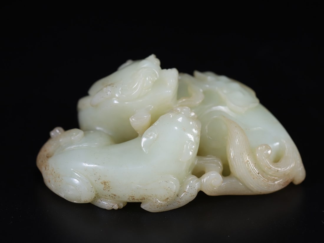 A Exquisite Hotan Jade Auspicious Beast Ornament (1 of 9)