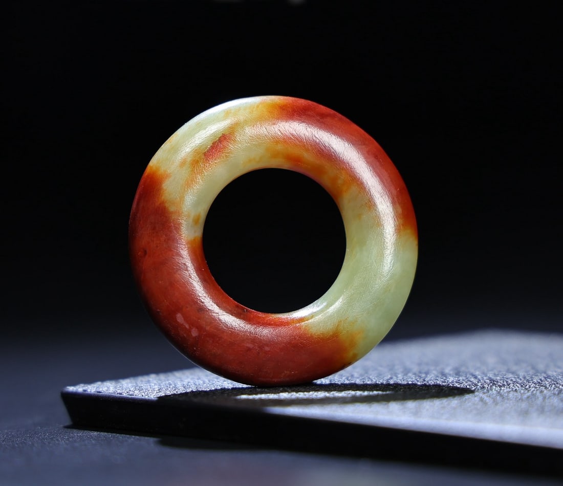 A Exquisite Hetian Jade Handheld Ornament: A Exquisite Hetian Jade Handheld Ornament,Han Dynasty, China,Size:1.9inx0.3in,Weight:27g 和田玉手把件,中国汉代