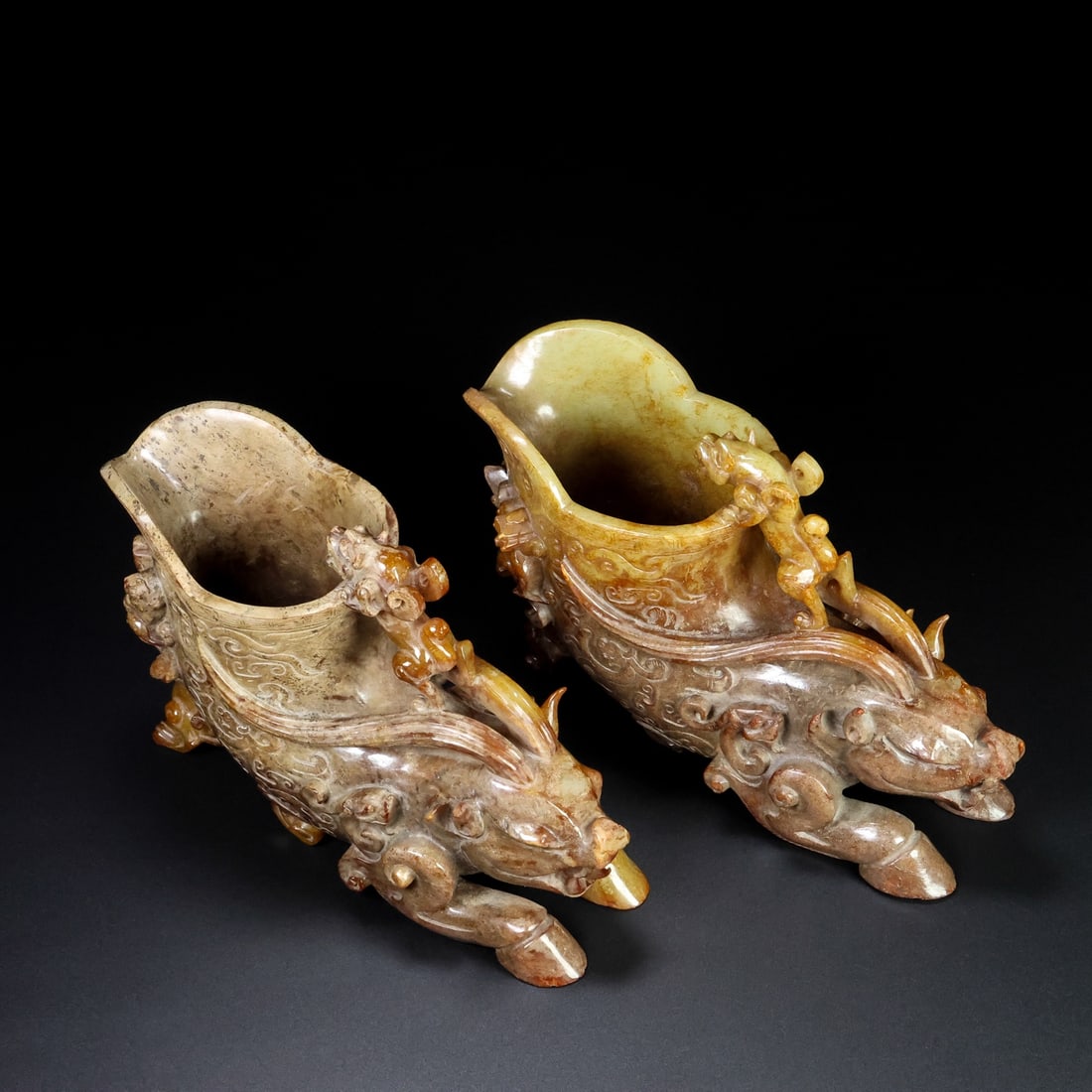 A pair of Exquisite Hetian Jade Dragon-Shaped Cup: A pair of Exquisite Hetian Jade Dragon-Shaped Cup,Han Dynasty, China,Size:6.7inx3.1inx4.7in,Weight:2183g 一对和田玉龙杯,中国汉代