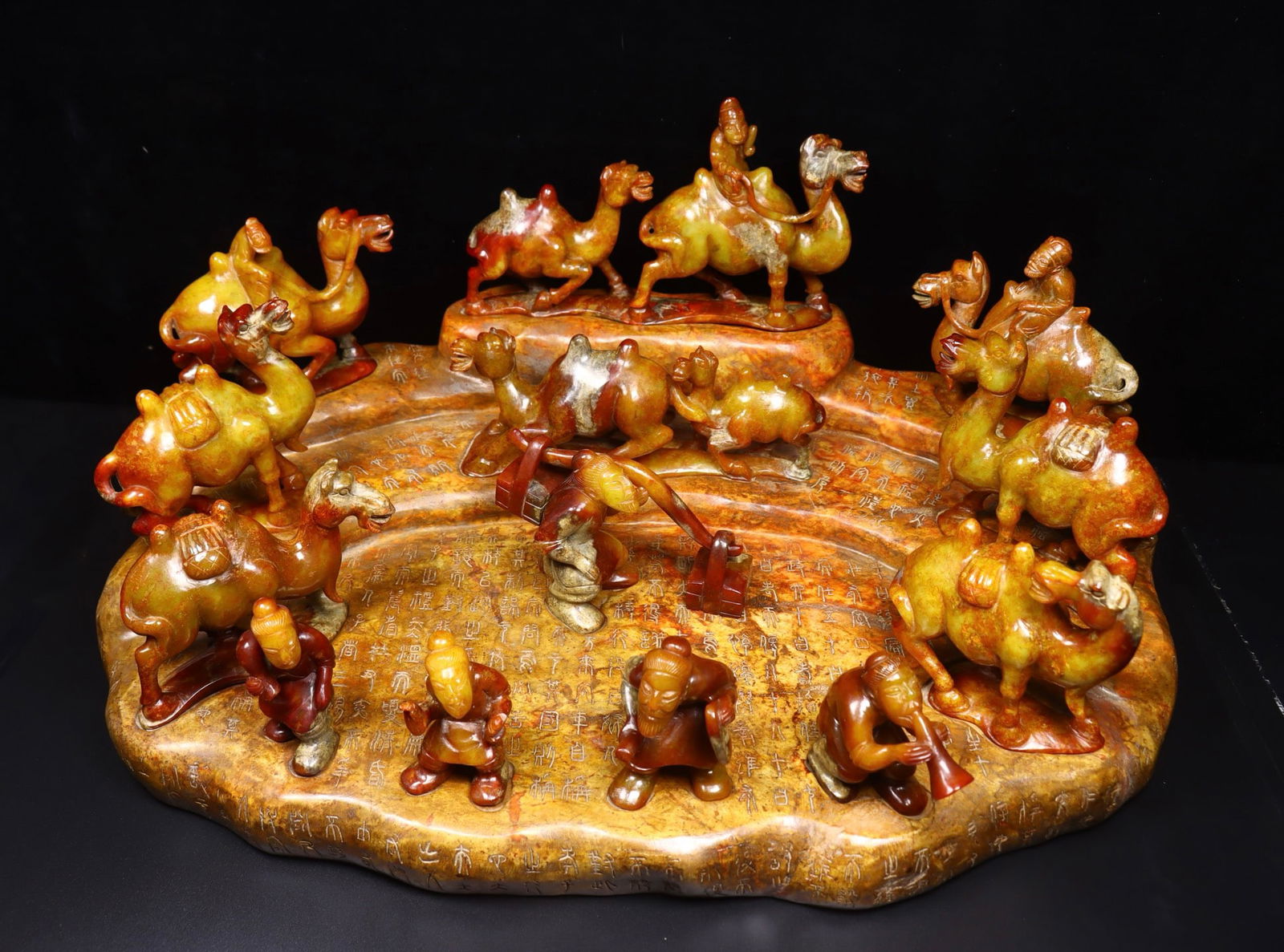 A Set of Exquisite Hotan Jade Figures Ornament: A Set of Exquisite Hotan Jade Figures Ornament,Han Dynasty, China,Size:9.1inx1.6inx5.5in(Camel),3.1inx1.6inx3.1in(Figure),22inx15inx4.7in(Base),Weight:978g(Camel),170g(Figure) 