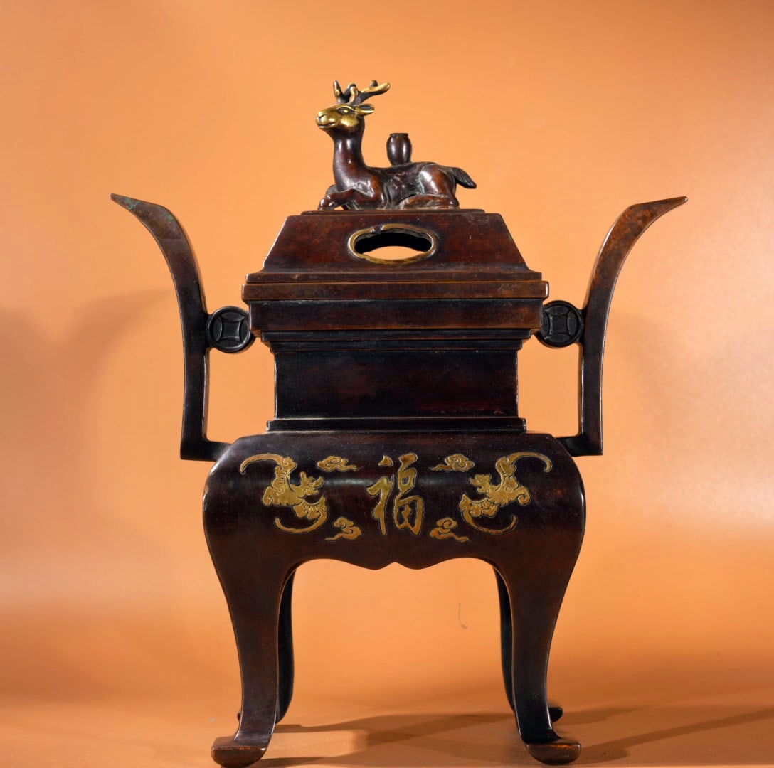 A Exquisite Gilt Bronze Double-Ears Censer: A Exquisite Gilt Bronze Double-Ears Censer,Ming Dynasty, China,Xuande Six-character Mark,Size:11.2inx4.7inx3.3in,Weight:5125g 