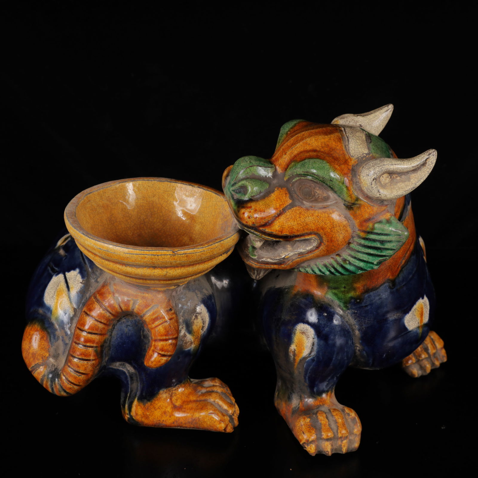 An Exquisite Tang Tri-Color Glazed Pottery Kylin Ornament: An Exquisite Tang Tri-Color Glazed Pottery Kylin Ornament,Tang Dynasty,China,Size:11inx7.1inx7.5in,Weight:2550g 