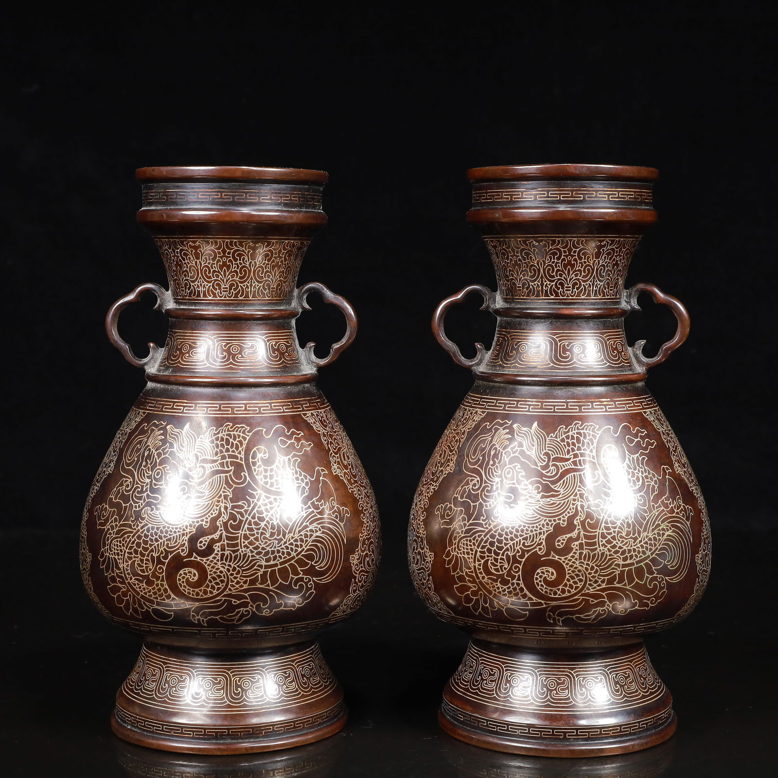 A Pair of Rare Bronze Dragon Pattern Double-Ears Vases: A Pair of Rare Bronze Dragon Pattern Double-Ears Vases,Ming Dynasty,China,With Mark,Size:3.5inx7.1in,Weight:4850g 