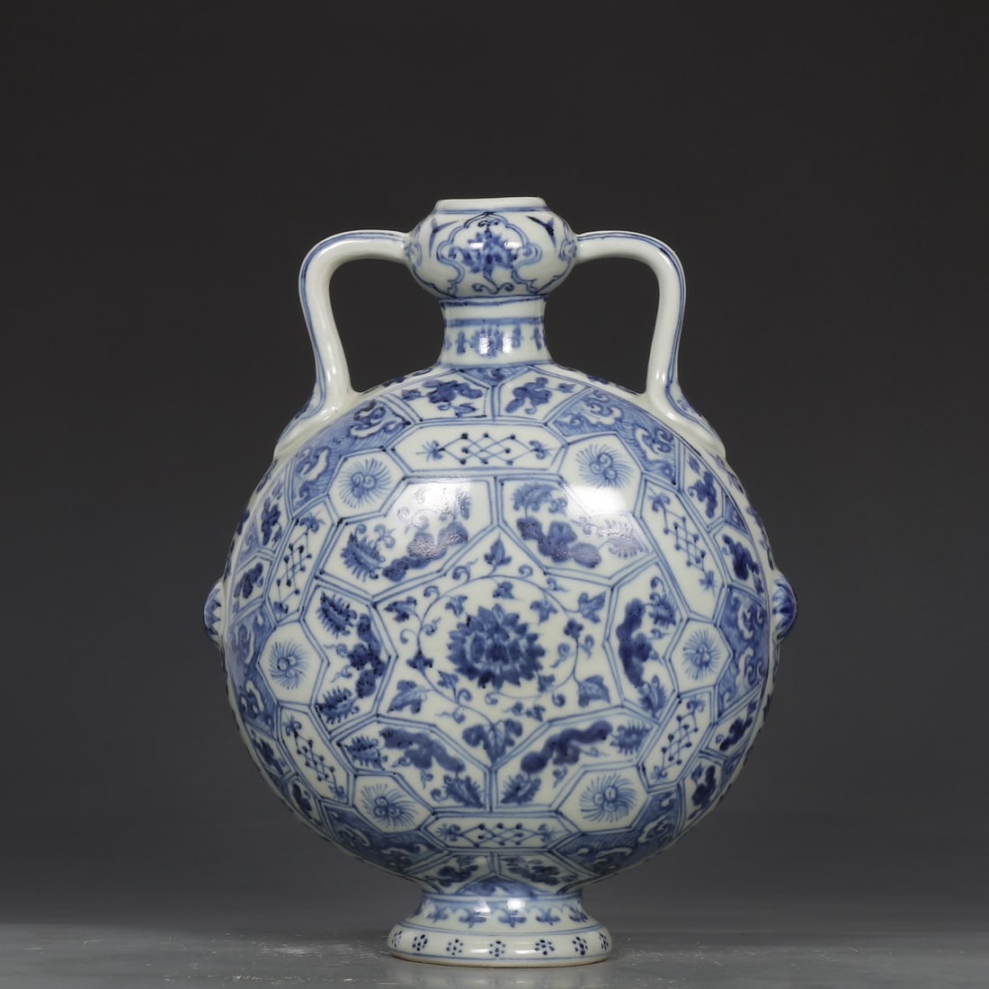 An Exquisite Blue and White Flower Pattern Double-Ears Vase: An Exquisite Blue and White Flower Pattern Double-Ears Vase,Ming Dynasty,China,Size:10.8inx8.3in 青花花卉纹双耳瓶,中国明代