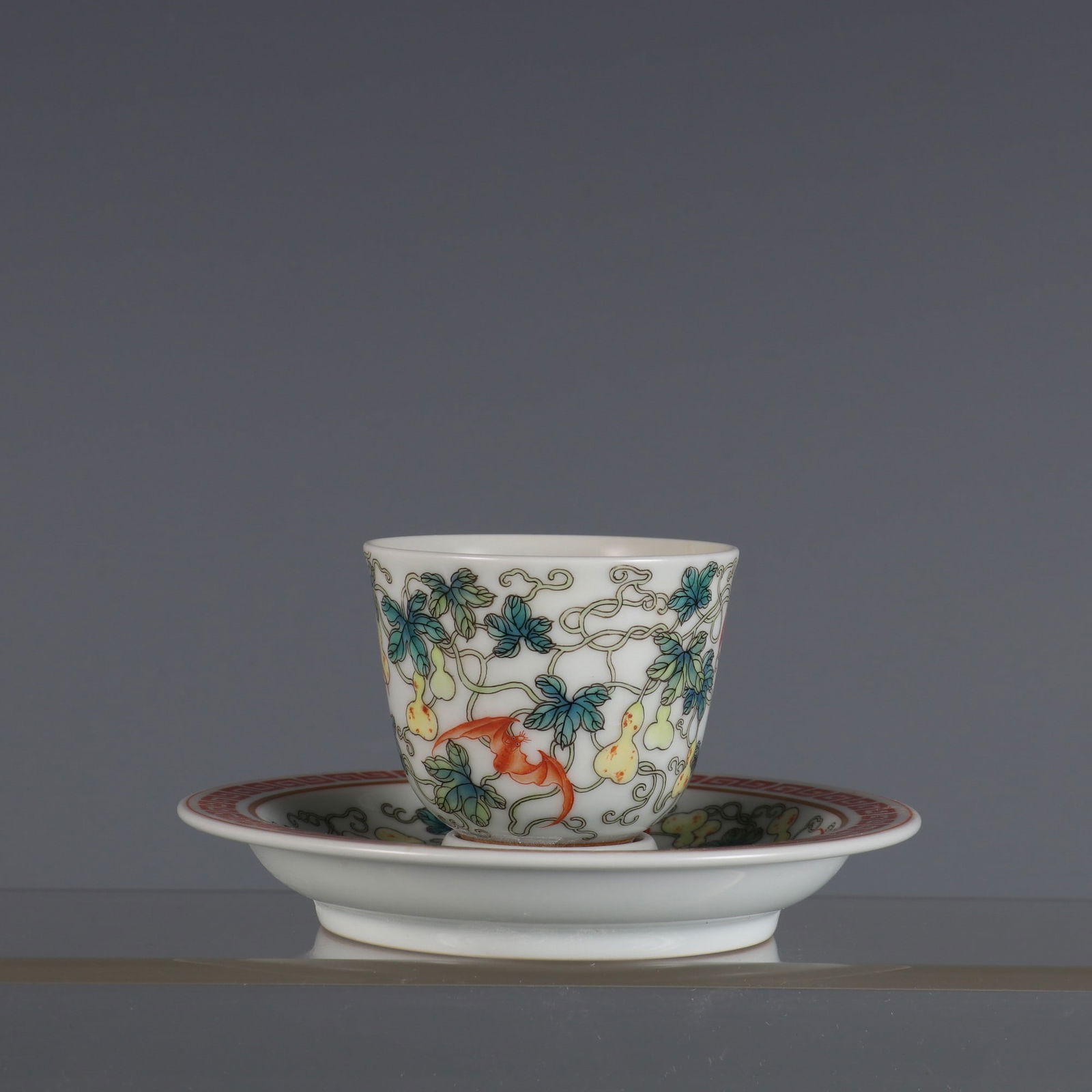 An Exquisite Famille-Rose Bats and Gourd Pattern Cup,with Plate: An Exquisite Famille-Rose Bats and Gourd Pattern Cup,with Plate,Qing Dynasty,China,Qianlong Six-character Mark,Size:2.6inx4.7in 粉彩蝙蝠葫芦纹杯,带