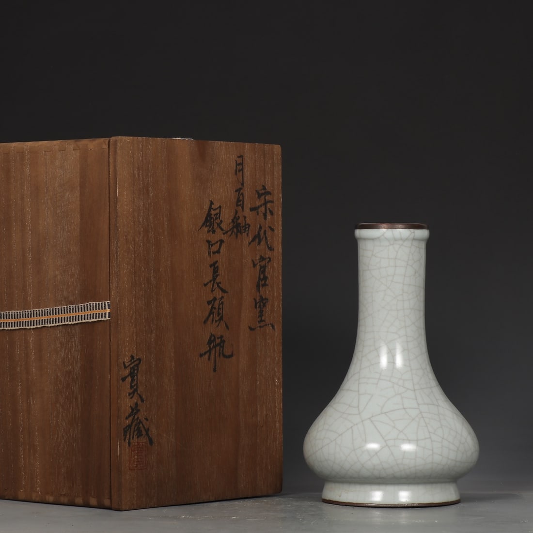An Exquisite Guan yao White Glazed Cover with Silver Vase,with an Imperial Poem by Emperor Qianlong: An Exquisite Guan yao White Glazed Cover with Silver Vase,with an Imperial Poem by Emperor Qianlong,Song Dynasty,China,Size:8.7inx5.5in 官窑白釉银口瓶,带
