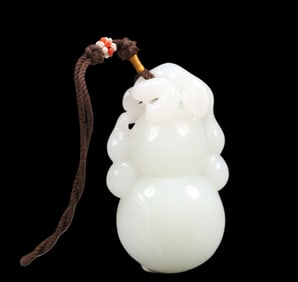 An Exquisite White Jade Gourd-Shaped Pendant