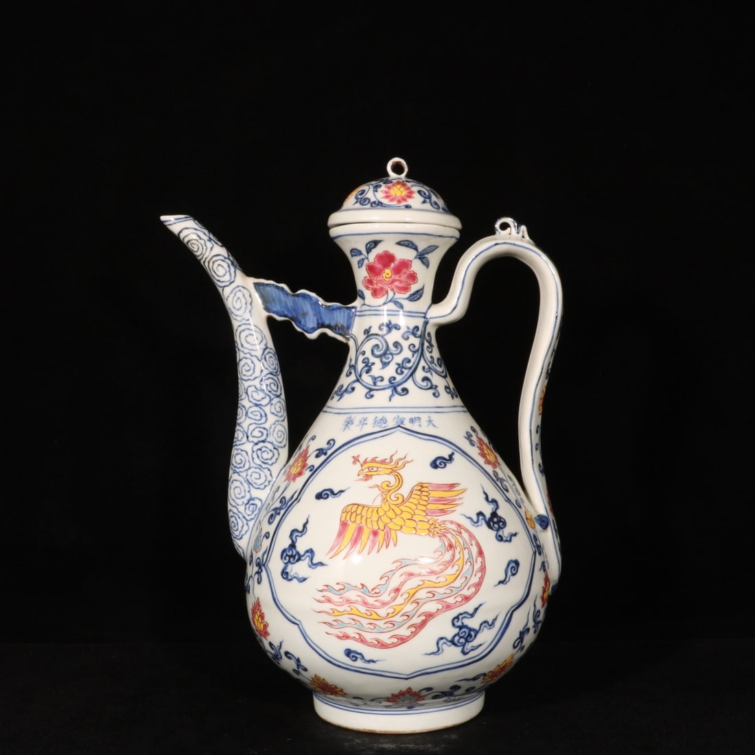 An Exquisite Blue and White Jiacai Auspicious Cloud and Phoenix Pattern Ewer (1 of 9)