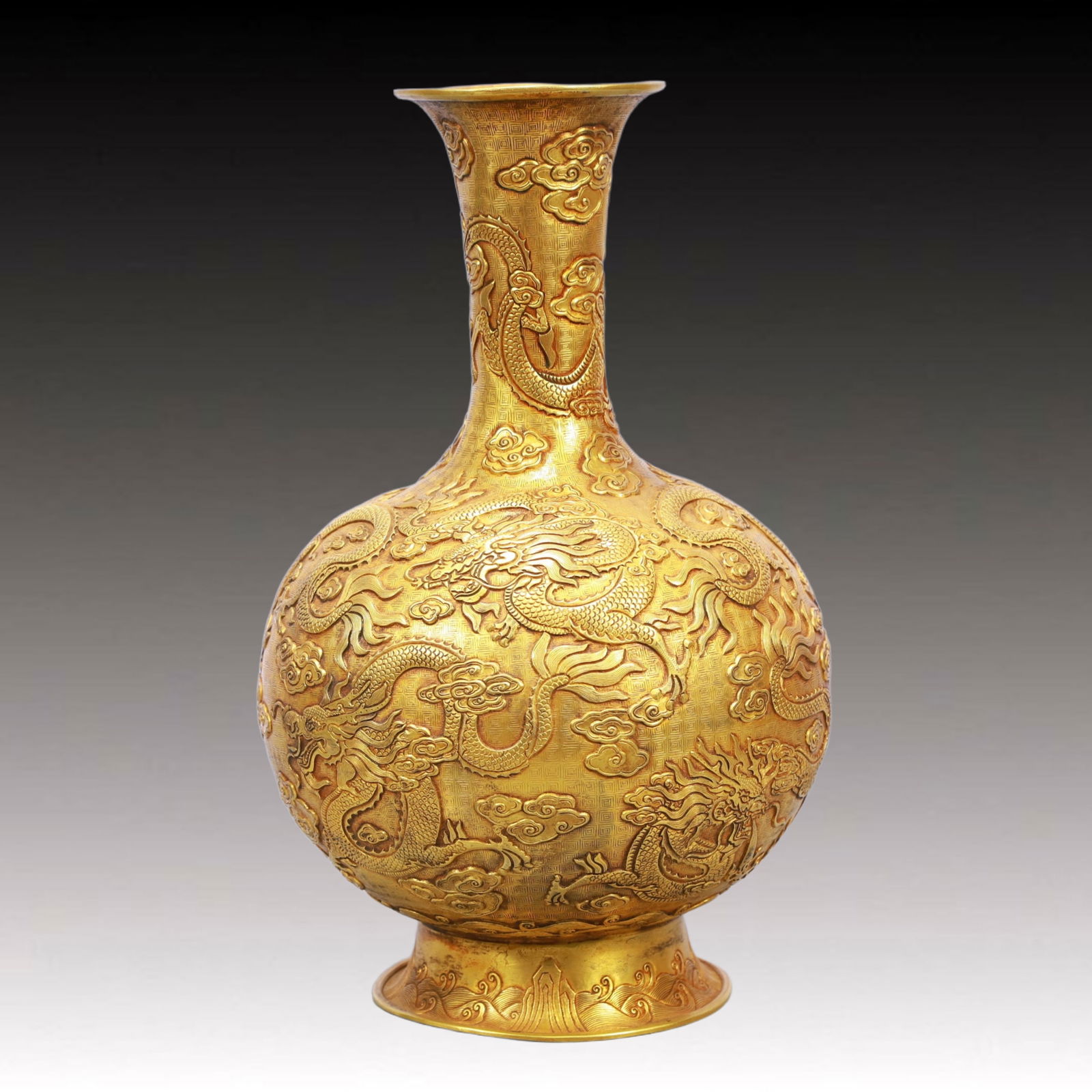 A Rare Gilt Bronze Auspicious Cloud and Dragon Pattern Vase: A Rare Gilt Bronze Auspicious Cloud and Dragon Pattern Vase,Qing Dynasty, China,Size:6.7inx11.8in,Weight:1850g 铜鎏金祥云龙纹瓶,中国清
