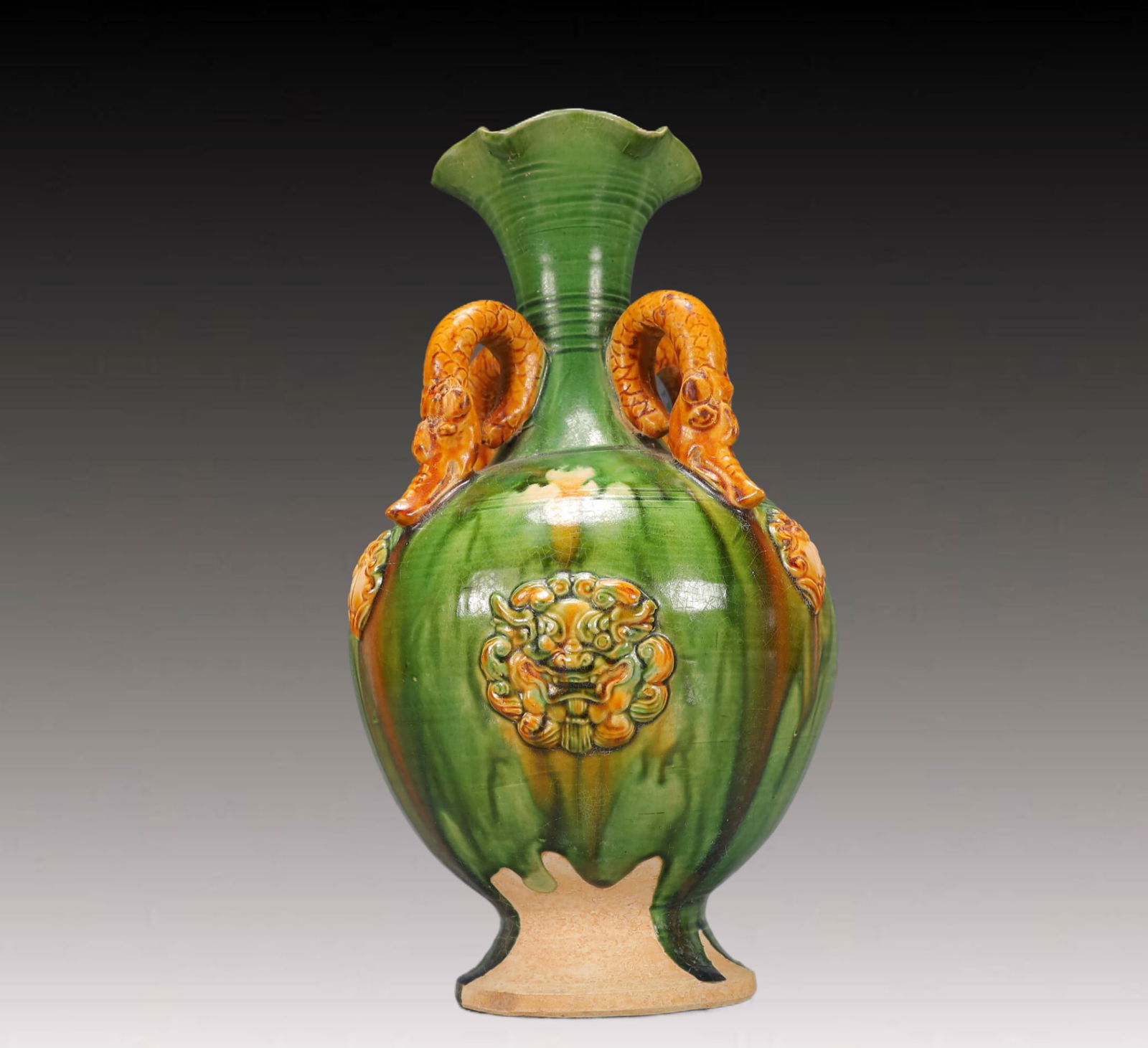 A Rare Tang Tri-Color Glazed Pottery Beast-Face Pattern Dragon-Ears Vase: A Rare Tang Tri-Color Glazed Pottery Beast-Face Pattern Dragon-Ears Vase,Tang Dynasty, China,Size:7.1inx7.1inx11.8in,Weight:1550g 