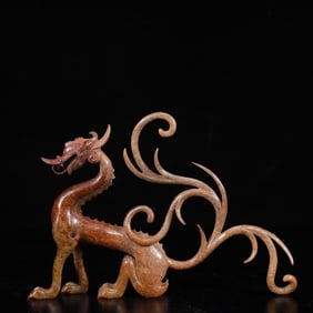 An Exquisite White Jade Dragon Ornament
