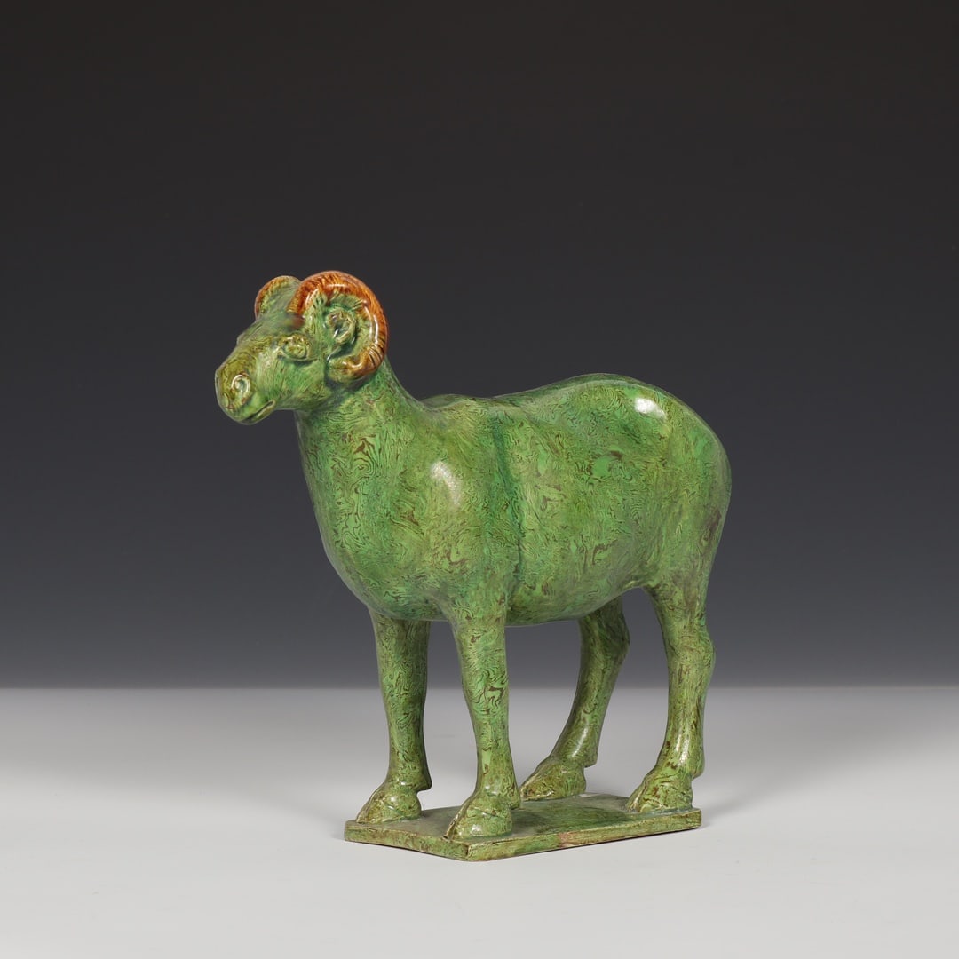 An Exquisite Gongxian yao Green Glazed Sheep Ornament: An Exquisite Gongxian yao Green Glazed Sheep Ornament,Tang Dynasty,China,Size:7.3inx8.3in 巩县窑绿釉羊摆件,中国唐代