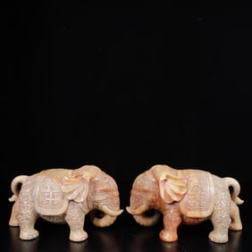A Pair of Exquisite White Jade Elephant Ornaments
