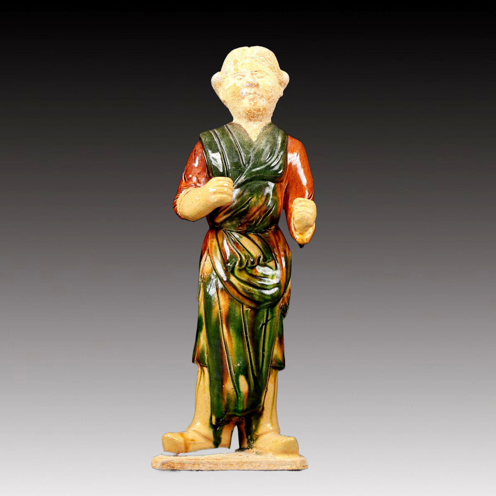 A Rare Tang Tri-Color Glazed Pottery Woman Ornament: A Rare Tang Tri-Color Glazed Pottery Woman Ornament,Tang Dynasty, China,Chinese Tang Tri-colored Pottery, or Tang Sancai, flourished during the Tang Dynasty (618–907 AD). It's renowned for its