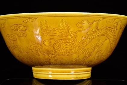 An Exquisite Yellow Glazed Auspicious Cloud and Dragon Pattern Bowl