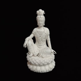 A Solemn Blance-De-Chine Statue of Avalokitesvara