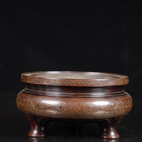 A Rare Bronze Chi-Dragon Pattern Tripod Censer