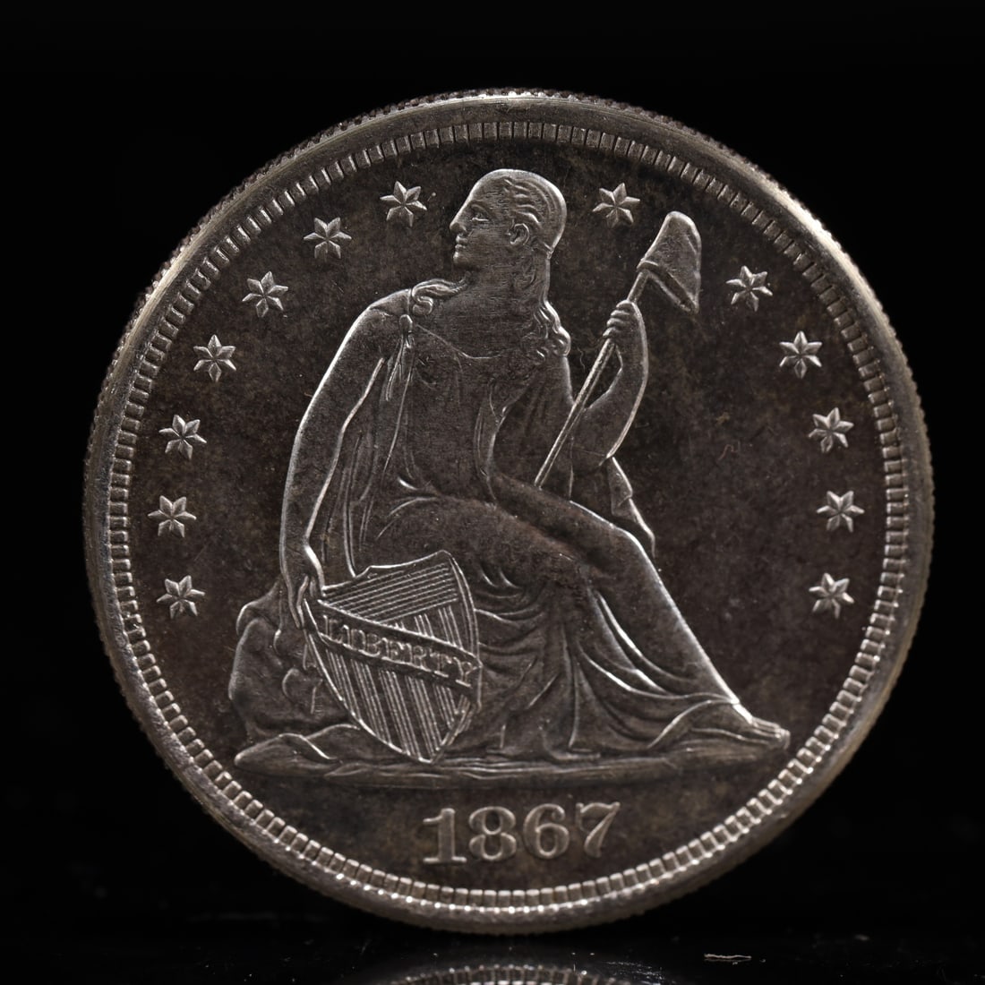 USA One Dollar 1867 Coin: American coin. IN GOD WE TRUST / LIBERTY / 1867 / UNITED STATES OF AMERICA / ONE DOL. Weight:26.9g.