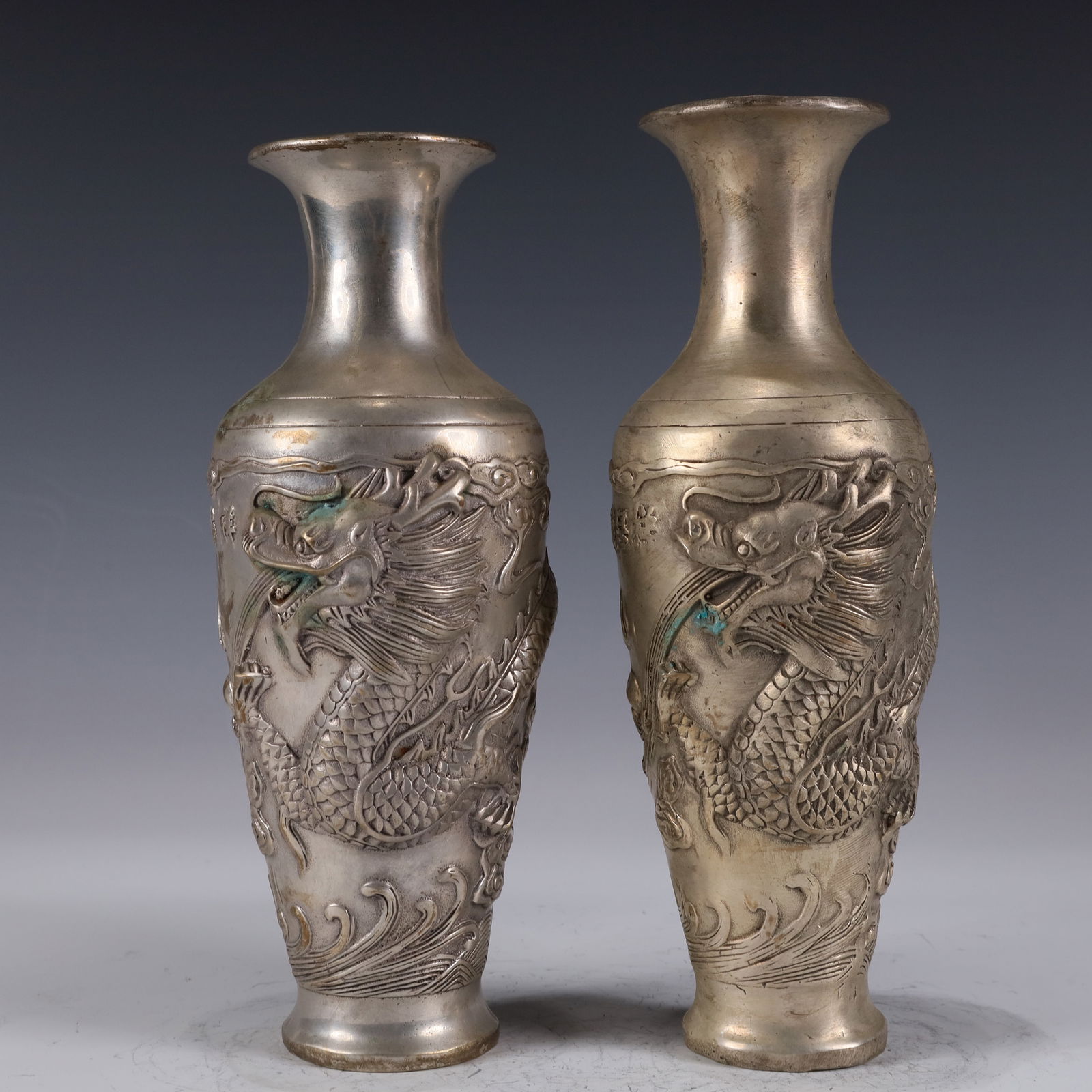 A Pair of Exquisite Silver-plated Dragon Patterened vases (1 of 9)