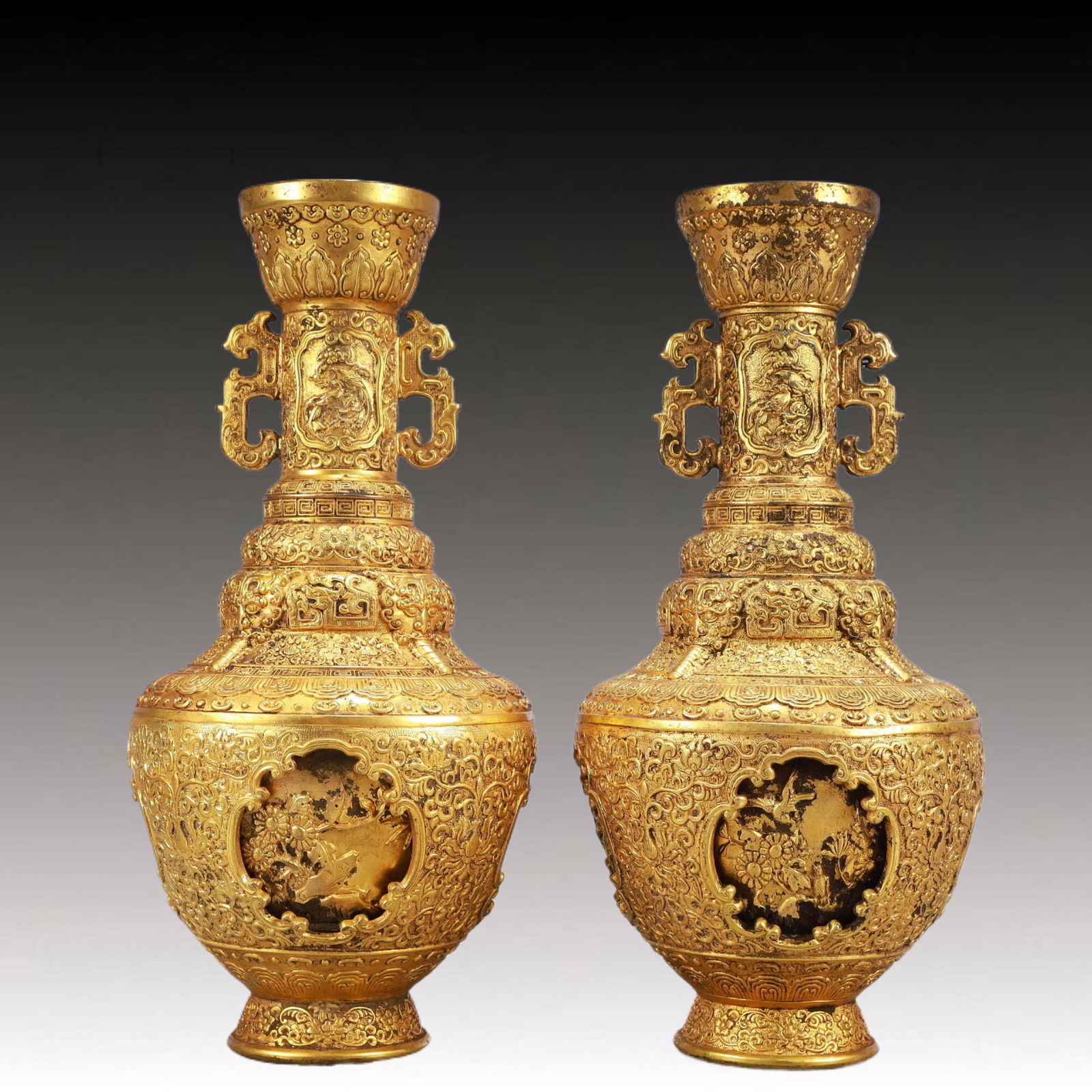 A Pair of Rare Gilt Bronze Flower and Bird Pattern Double-Ears Vases: A Pair of Rare Gilt Bronze Flower and Bird Pattern Double-Ears Vases,Ming Dynasty, China,Yongle Six-character Mark,Size:4.7inx10.6in,Weight:3750g 