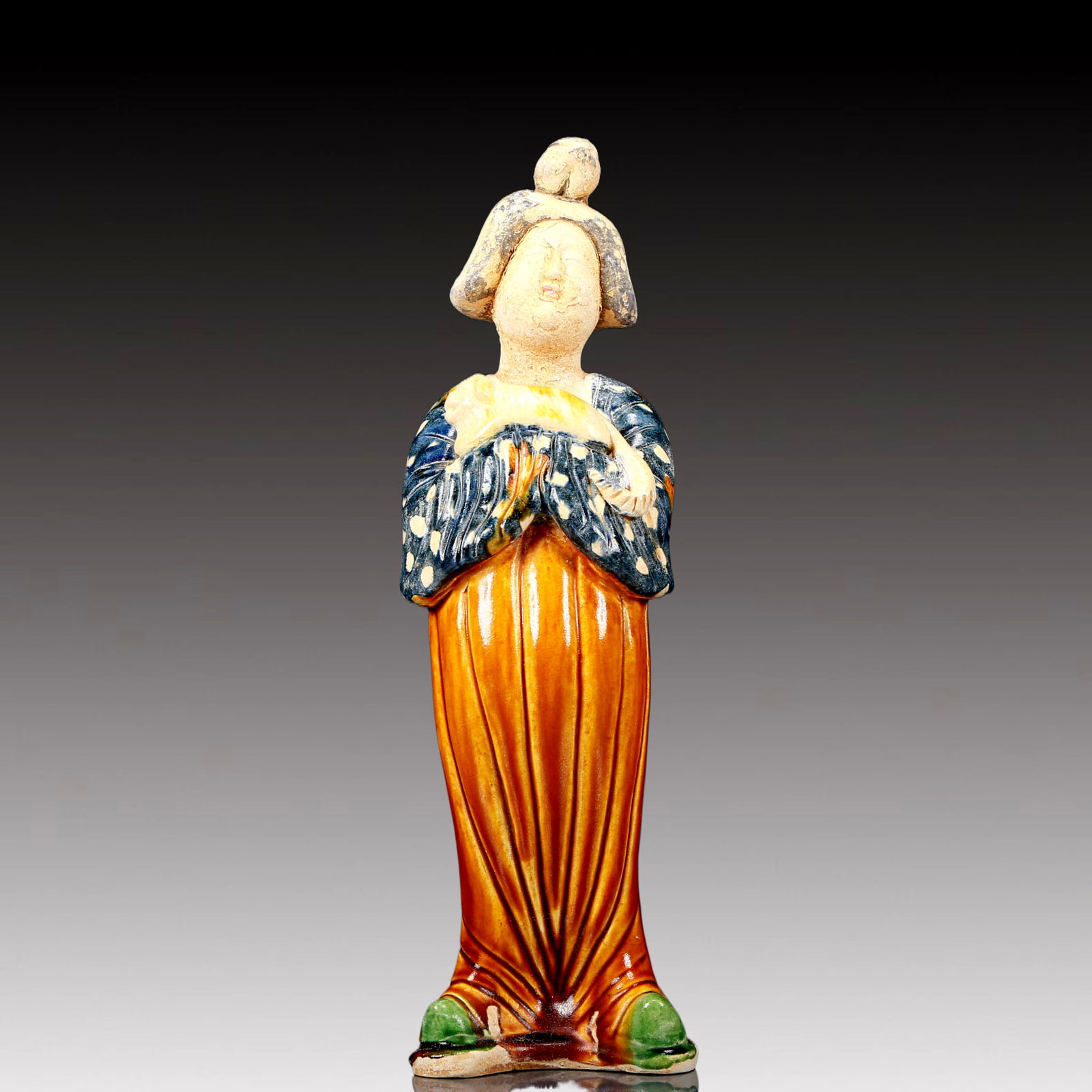 A Rare Tang Tri-Color Glazed Pottery Woman Ornament: A Rare Tang Tri-Color Glazed Pottery Woman Ornament,Tang Dynasty, China,Chinese Tang Tri-colored Pottery, or Tang Sancai, flourished during the Tang Dynasty (618–907 AD). It's renowned for its