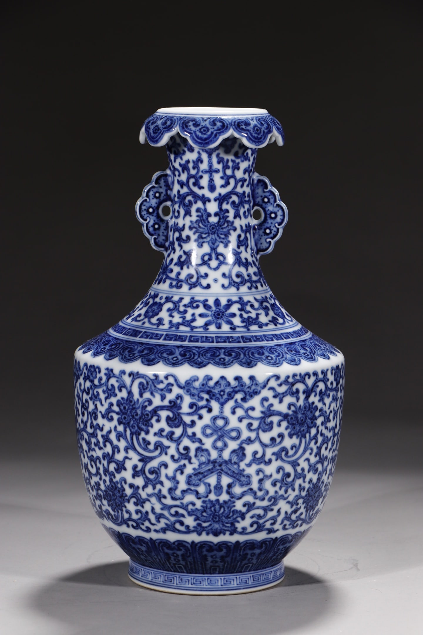 An Exquisite Blue and White Lotus Pattern Double-Ears Vase: An Exquisite Blue and White Lotus Pattern Double-Ears Vase,Qing Dynasty,China,Qianlong Six-character Mark,Size:10.8in 