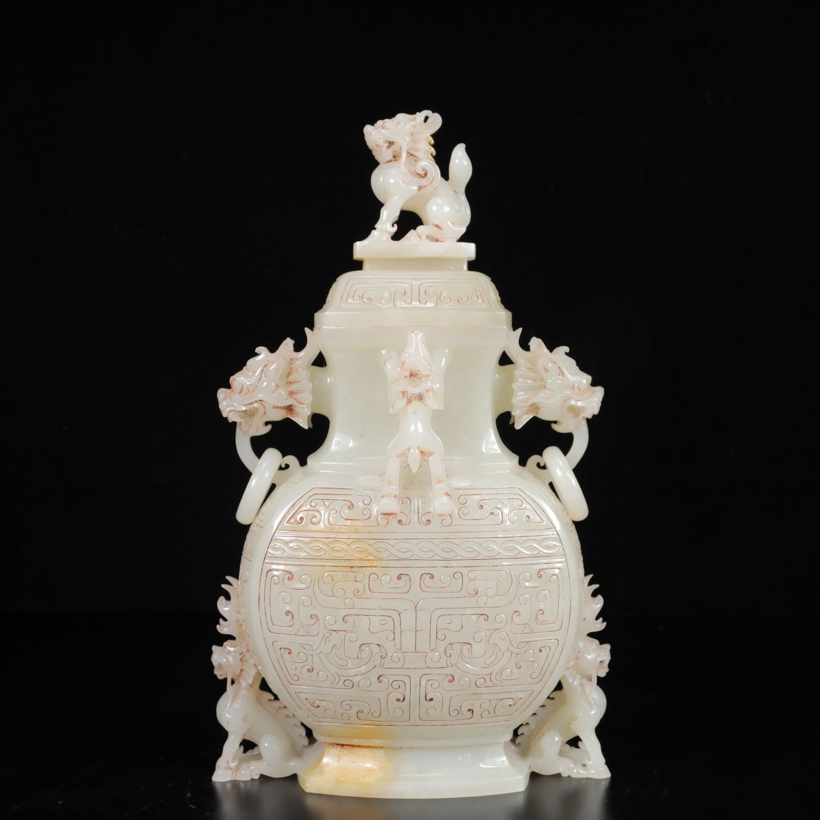 An Exquisite White Jade Beast-Face Pattern Dragon-Ears and Dragon Legs Vase: An Exquisite White Jade Beast-Face Pattern Dragon-Ears and Dragon Legs Vase,Qing Dynasty,China,Size:5.5inx2.8inx9.4in,Weight:1100g 