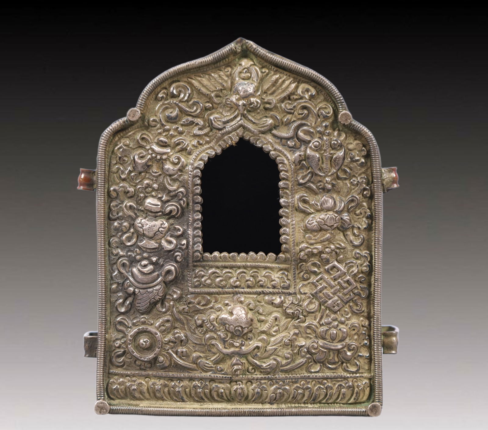 A Rare Bronze Flower Pattern Niche: A Rare Bronze Flower Pattern Niche,Ming Dynasty, China,Size:3.3inx1.4inx3.9in Weight:150g 铜花卉纹佛龛,中国明代